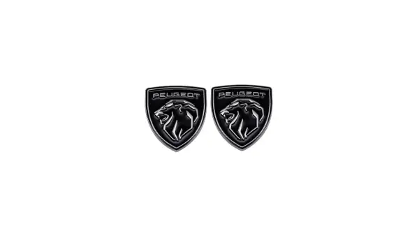 Dwa emblematy Peugeot z lwem, idealne jako klej do emblematów samochodowych.