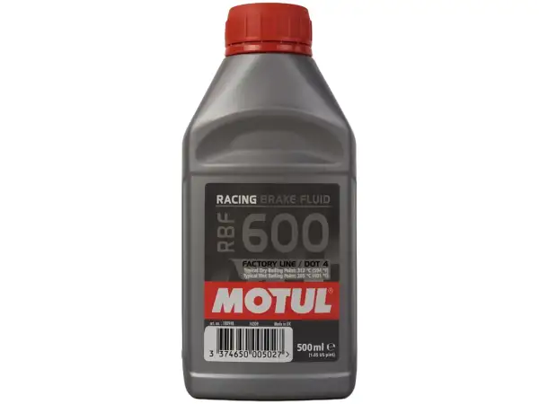 Szara butelka płynu hamulcowego Motul RBF 600 z czerwoną zakrętką.